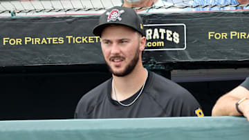 Mar 5, 2025; Bradenton, Florida, USA; Pittsburgh Pirates pitcher Paul Skenes (30) looks on from the dugout against the Toronto Blue Jays at LECOM Park. Mandatory Credit: Kim Klement Neitzel-Imagn Images