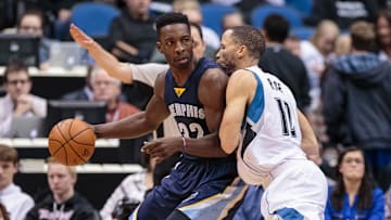 Nov 15, 2015; Minneapolis, MN, USA; Memphis Grizzlies forward Jeff Green (32) dribbles the ball as Minnesota Timberwolves forward Tayshaun Prince (12) defends in the third quarter at Target Center. The Grizzlies won 114-106. Mandatory Credit: Brad Rempel-Imagn Images