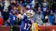 Buffalo Bills quarterback Josh Allen (17) steps into this throw over the middle. Allen only threw for 169 yards but scored 2 rushing touchdowns in a 27-21 win over New England.