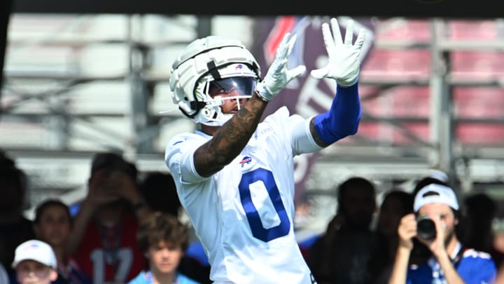 Jul 24, 2024; Rochester, NY, USA; Buffalo Bills wide receiver Keon Coleman (0) catches a pass during training camp at St. John Fisher University. Mandatory Credit: Mark Konezny-USA TODAY Sports