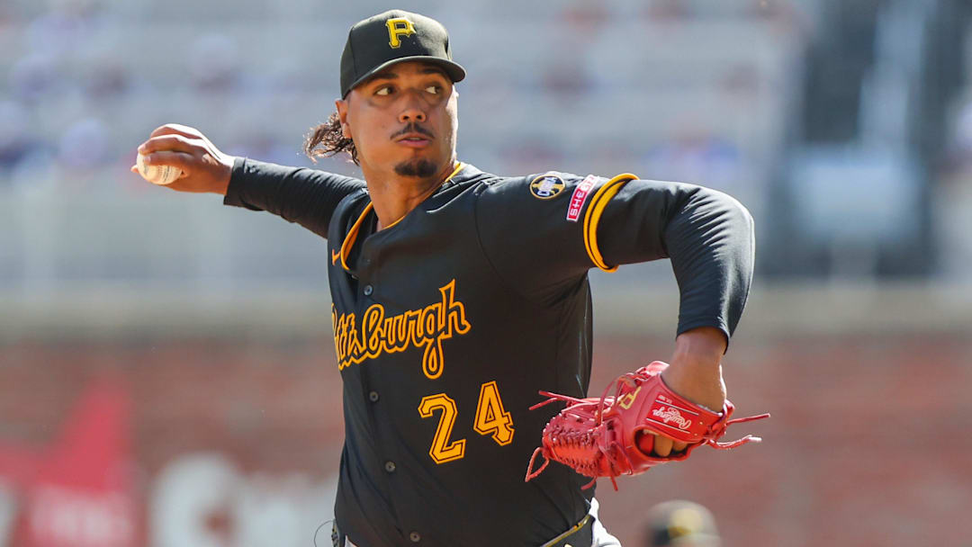 Sep 28, 2025; Cumberland, Georgia, USA; Pittsburgh Pirates pitcher Johan Oviedo (24) pitches against the Atlanta Braves during the second inning at Truist Park. Mandatory Credit: Jordan Godfree-Imagn Images