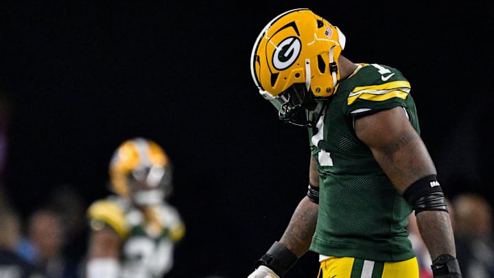 Green Bay Packers defensive end Micah Parsons (1) walks off the field after the Dallas Cowboys scored the go-ahead touchdown.