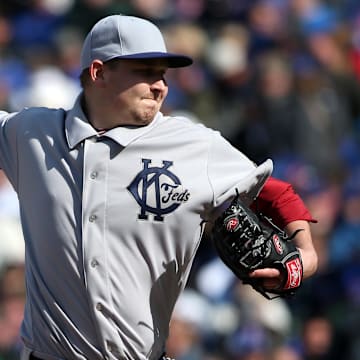 Arizona Diamondbacks pitcher Trevor Cahill throws a pitch against the Chicago Cubs during the eighth inning of a baseball game at Wrigley Field on April 23, 2014
