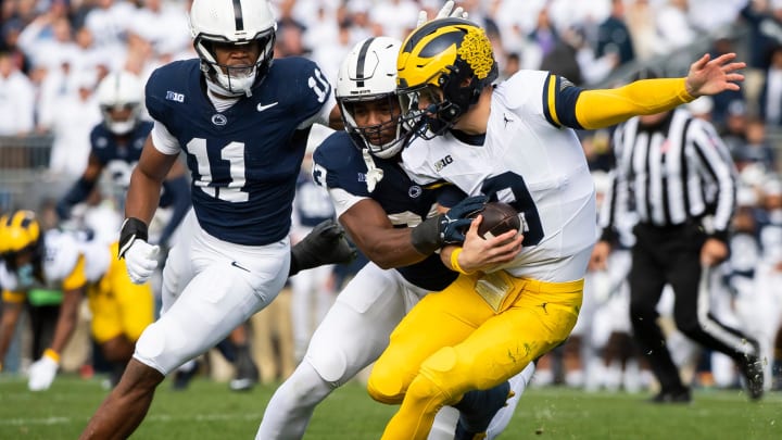 Penn State defensive end Dani Dennis-Sutton sacks Michigan quarterback J.J. McCarthy.