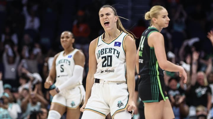 Jun 25, 2024; Belmont Park, New York, USA; New York Liberty guard Sabrina Ionescu (20) celebrates after making a three point shot against the Minnesota Lynx in the second quarter of the Commissioner’s Cup Championship game at UBS Arena. Mandatory Credit: Wendell Cruz-USA TODAY Sports