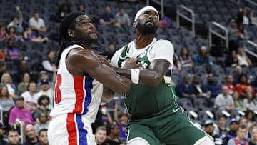 Oct 6, 2024; Detroit, Michigan, USA;  Detroit Pistons center Isaiah Stewart (28) and Milwaukee Bucks forward Bobby Portis (9): Rick Osentoski-Imagn Images