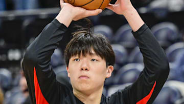 Oct 16, 2025; Salt Lake City, Utah, USA; Portland Trail Blazers center Yang Hansen (16) warms up before the game against the Utah Jazz at Delta Center. Mandatory Credit: Peter Creveling-Imagn Images