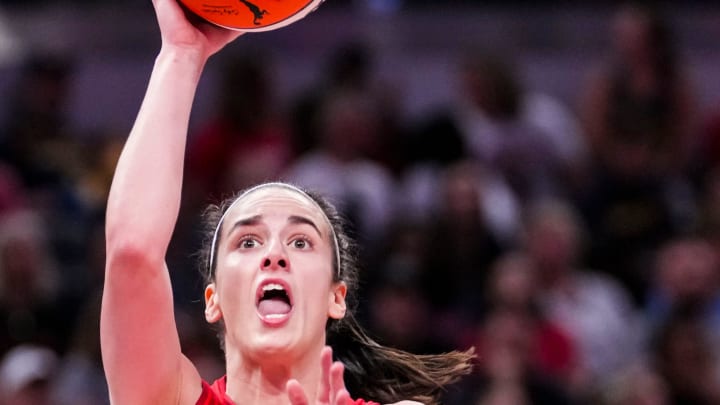 Indiana Fever guard Caitlin Clark (22) goes up for a shot Friday, Aug. 16, 2024, during the game at Gainbridge Fieldhouse in Indianapolis.