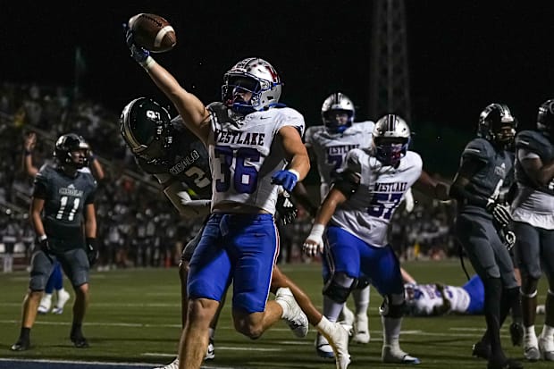 Westlake running back Grady Bartlett (36) celebrates a touchdown during the game against Steele at Lehnoff Stadium on Friday.