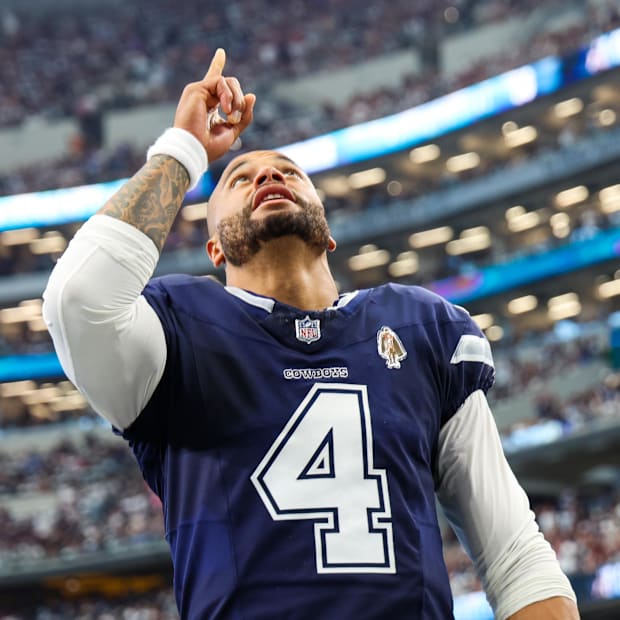 Dallas Cowboys quarterback Dak Prescott prays before the game against the Detroit Lions.