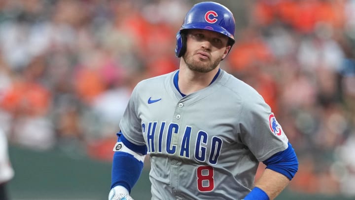 Jul 9, 2024; Baltimore, Maryland, USA; Chicago Cubs outfielder Ian Happ (8) rounds the bases following his three run home run in the fourth inning against the Baltimore Orioles at Oriole Park at Camden Yards.