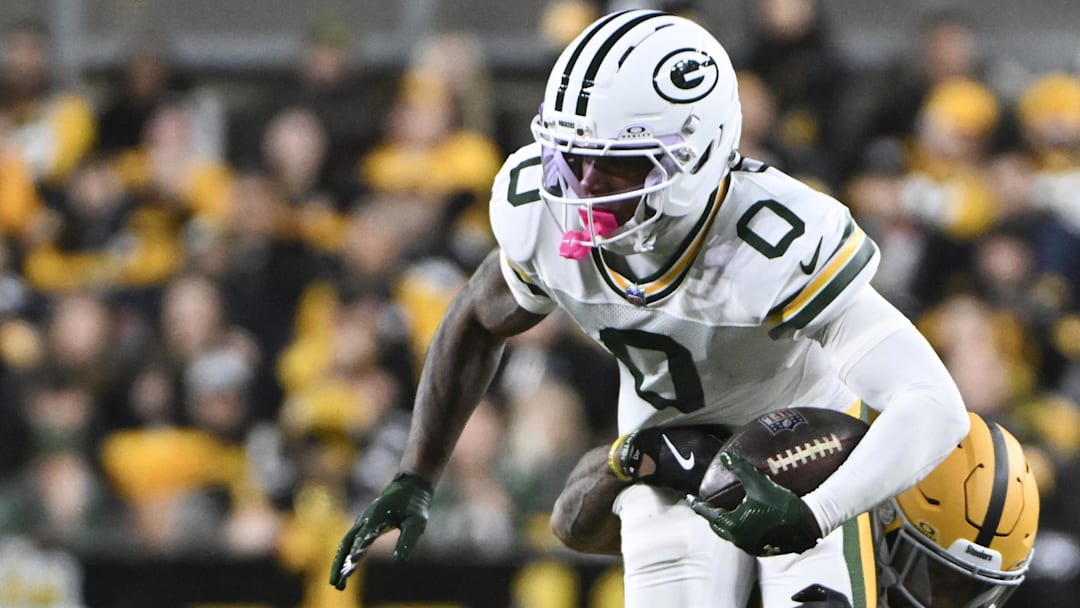 Oct 26, 2025; Pittsburgh, Pennsylvania, USA; Green Bay Packers wide receiver Matthew Golden is tackled by Pittsburgh Steelers cornerback Darius Slay (23) during the first quarter at Acrisure Stadium.