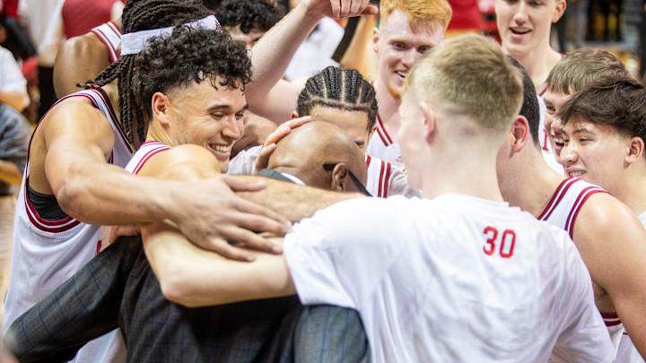 Indiana's Anthony Leal (3) celebrates with Coach Mike Woodson and the Hoosiers during the Indiana versus Purdue mens basketball game at Simon Skjodt Assembly Hall on Sunday, Feb. 23, 2025.
