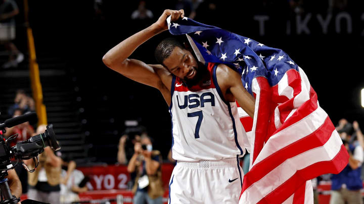 Aug 7, 2021; Saitama, Japan; United States forward Kevin Durant (7) celebrates winning the gold medal against France in the men's basketball gold medal game during the Tokyo 2020 Olympic Summer Games at Saitama Super Arena. Mandatory Credit: Geoff Burke-USA TODAY Sports