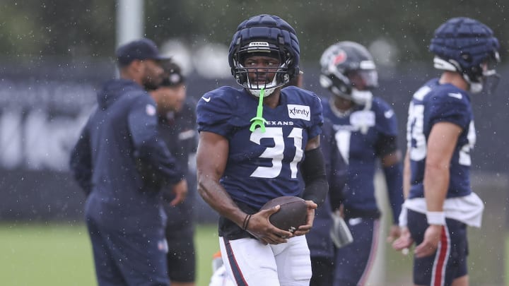 Jul 27, 2024; Houston, TX, USA; Houston Texans running back Dameon Pierce (31) during training camp at Houston Methodist Training Center. Mandatory Credit: Troy Taormina-USA TODAY Sports