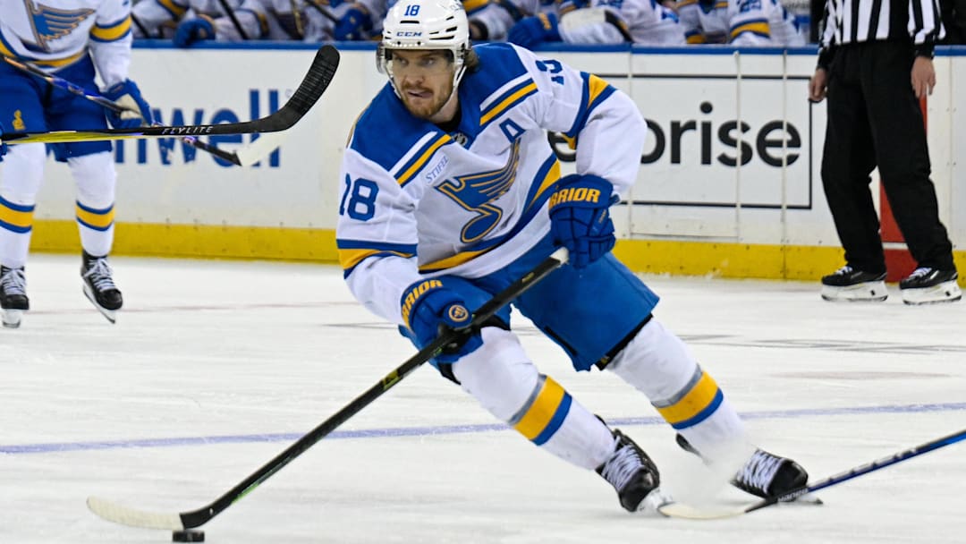 Nov 24, 2025; New York, New York, USA; St. Louis Blues center Robert Thomas (18) skates with the puck against the New York Rangers during the third period at Madison Square Garden. Mandatory Credit: Dennis Schneidler-Imagn Images Nov 24, 2025; New York, New York, USA; St. Louis Blues center Robert Thomas (18) skates with the puck against the New York Rangers during the third period at Madison Square Garden. Mandatory Credit: Dennis Schneidler-Imagn Images