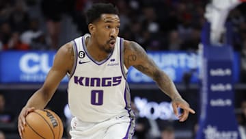 Dec 16, 2022; Detroit, Michigan, USA;  Sacramento Kings guard Malik Monk (0) dribbles in the first half against the Detroit Pistons at Little Caesars Arena. Mandatory Credit: Rick Osentoski-Imagn Images
