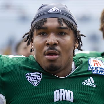Dec 30, 2022; Tucson, AZ, USA; Ohio Bobcats defensive tackle Bralen Henderson (81) against the Wyoming Cowboys during the 2022 Barstool Sports Arizona Bowl at Arizona Stadium. Mandatory Credit: Mark J. Rebilas-Imagn Images