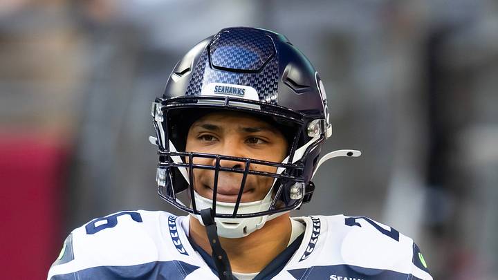 Seattle Seahawks running back Zach Charbonnet looks at the sideline