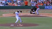 Baltimore Orioles pitcher Felix Bautista throws a pitch to Boston Red Sox right fielder Trayce Thompson at Spring Training.