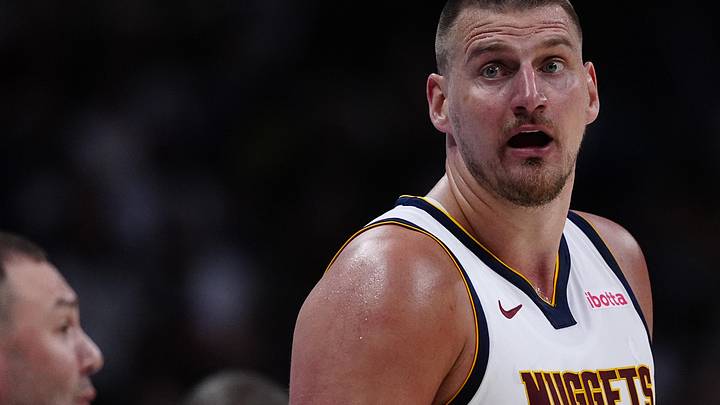 Apr 11, 2025; Denver, Colorado, USA; Denver Nuggets center Nikola Jokic (15) reacts in the fourth quarter against the Memphis Grizzlies at Ball Arena. Mandatory Credit: Ron Chenoy-Imagn Images