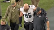 Philadelphia Eagles offensive tackle Lane Johnson limps from the field after suffering an ankle injury against the Green Bay Packers.