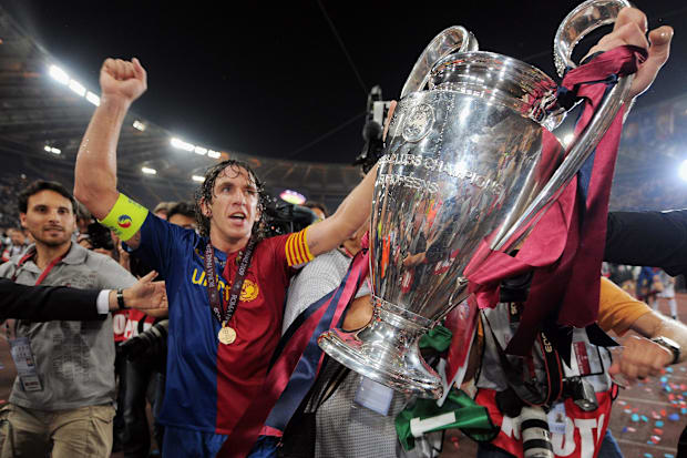 Carles Puyol celebrates after helping Barcelona defeat Manchester United in the 2009 Champions League final.