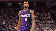 Mar 20, 2025; Sacramento, California, USA; Sacramento Kings guard Malik Monk (0) looks on during the second quarter of the game against the Chicago Bulls at Golden 1 Center. Mandatory Credit: Ed Szczepanski-Imagn Images