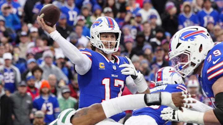 Buffalo Bills quarterback Josh Allen (17) throws the ball against the New York Jets. Buffalo Bills quarterback Josh Allen (17) throws the ball against the New York Jets.