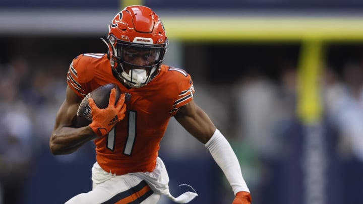 Oct 30, 2022; Arlington, Texas, USA; Chicago Bears wide receiver Darnell Mooney (11) runs for a first down in the third quarter against the Dallas Cowboys at AT&T Stadium. 