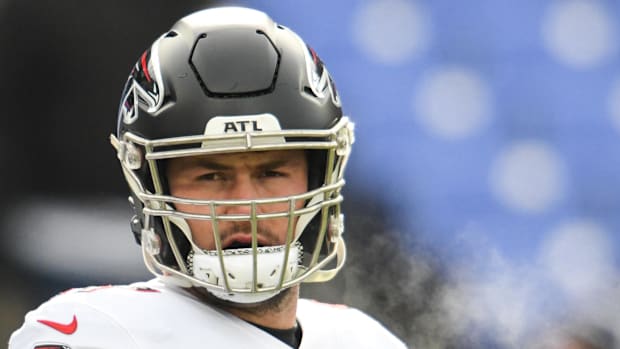 Atlanta Falcons center Drew Dalman (67) stands on the field before the game