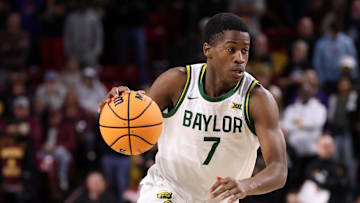 Jan 11, 2025; Tempe, Arizona, USA; Baylor Bears guard VJ Edgecombe (7) against the Arizona State Sun Devils at Desert Financial Arena. Mandatory Credit: Mark J. Rebilas-Imagn Images
