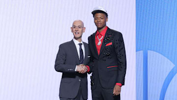 Jun 25, 2025; Brooklyn, NY, USA;  Ace Bailey stands with NBA commissioner Adam Silver after being selected as the fifth pick by the Utah Jazz in the first round of the 2025 NBA Draft at Barclays Center. Mandatory Credit: Brad Penner-Imagn Images