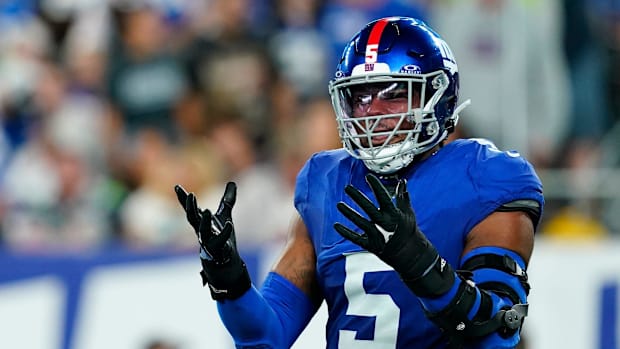 New York Giants linebacker Kayvon Thibodeaux reacts to nearly intercepting Seattle Seahawks quarterback Geno Smith.