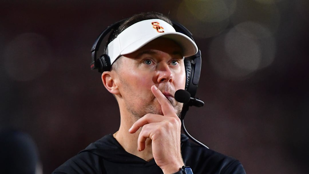Nov 7, 2025; Los Angeles, California, USA; Southern California Trojans head coach Lincoln Riley watches game action against the Northwestern Wildcats during the second half at the Los Angeles Memorial Coliseum. Mandatory Credit: Gary A. Vasquez-Imagn Images