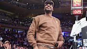 Apr 29, 2025; New York, New York, USA; Former NBA forward Carmelo Anthony waves to the crowd during game five of first round for the 2025 NBA Playoffs between the against the Detroit Pistons and the New York Knicks at Madison Square Garden. Mandatory Credit: Wendell Cruz-Imagn Images