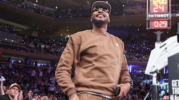 Carmelo Anthony took a timeout from watching the Knicks to speak at Syracuse's graduation ceremony. 