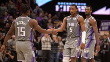 Nov 13, 2022; Sacramento, California, USA; Sacramento Kings guard Davion Mitchell (15) and guard De'Aaron Fox (5) celebrate after defeating the Golden State Warriors at Golden 1 Center. Mandatory Credit: Ed Szczepanski-USA TODAY Sports