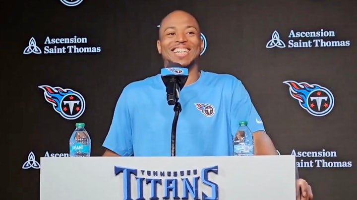 Tennessee Titans receiver Tyler Lockett laughs while speaking to media. Tennessee Titans receiver Tyler Lockett laughs while speaking to media.