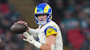 Oct 19, 2025; London, United Kingdom; Los Angeles Rams quarterback Matthew Stafford (9) looks to pass the ball against the Jacksonville Jaguars during the second half of an NFL International Series game at Wembley Stadium. Mandatory Credit: Kirby Lee-Imagn Images