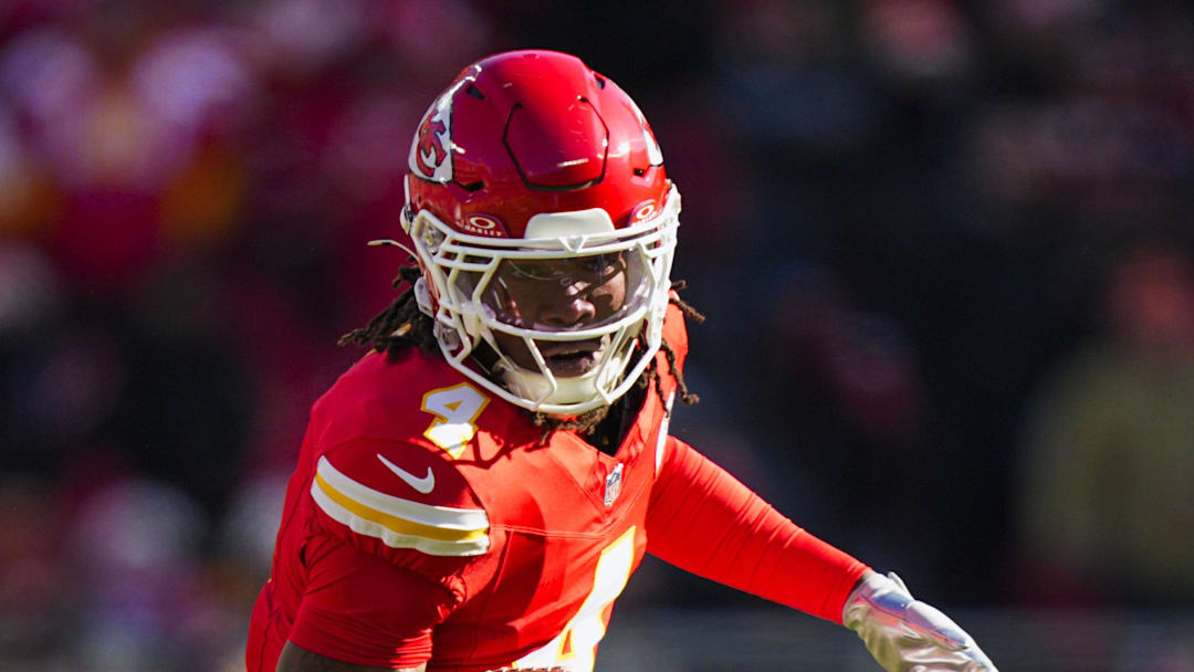 Dec 14, 2025; Kansas City, Missouri, USA; Kansas City Chiefs wide receiver Rashee Rice (4) runs for yards after the catch against the Los Angeles Chargers during the first quarter at GEHA Field at Arrowhead Stadium. Mandatory Credit: Jay Biggerstaff-Imagn Images