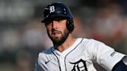 Aug 9, 2025; Detroit, Michigan, USA;  Detroit Tigers right fielder Matt Vierling (8) hustles back to first base to avoid being doubled off on a fly ball to deep right field against the Los Angeles Angels in the second inning at Comerica Park.