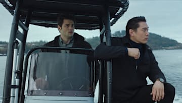 The Recruit. (L to R) Noah Centineo as Owen Hendricks, Teo Yoo as Jang Kyun Kim in Episode 206 of The Recruit. Cr. Courtesy of Netflix © 2024