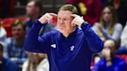 Self motions to the Jayhawks during their game against Utah.