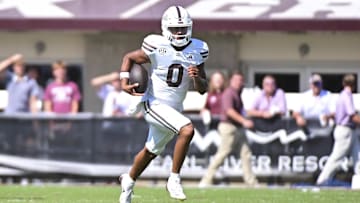 Sep 21, 2024; Starkville, Mississippi, USA; Mississippi State Bulldogs quarterback Michael Van Buren Jr. (0) runs the ball against the Florida Gators during the fourth quarter at Davis Wade Stadium at Scott Field. Mandatory Credit: Matt Bush-Imagn Images