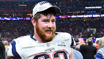 Former New England Patriots offensive guard Joe Thuney (62) celebrates after winning Super Bowl LIII against the Los Angeles Rams at Mercedes-Benz Stadium.