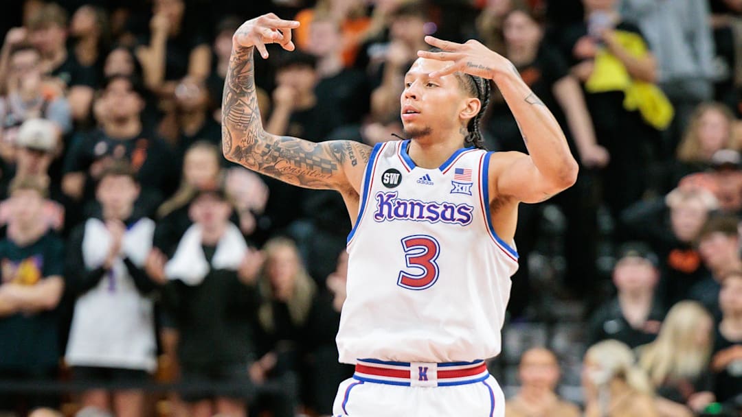 Feb 18, 2026; Stillwater, Oklahoma, USA; Kansas Jayhawks guard Tre White (3) reacts after shooting a three point basket during the second half against the Oklahoma State Cowboys at Gallagher-Iba Arena. Mandatory Credit: William Purnell-Imagn Images