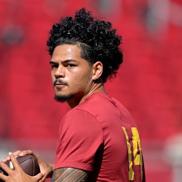 Sep 6, 2025; Los Angeles, California, USA;  USC Trojans quarterback Jayden Maiava (14) warms up prior to the game against the Georgia Southern Eagles at United Airlines Field at Los Angeles Memorial Coliseum.