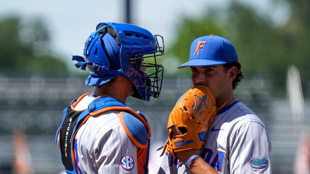 Florida catcher Luke Heyman (28) talks to pitcher Jake Clemente (20) during the game against the Texas Longhorns at UFCU Disch-Falk Field on Sunday, May 11, 2025 in Austin.