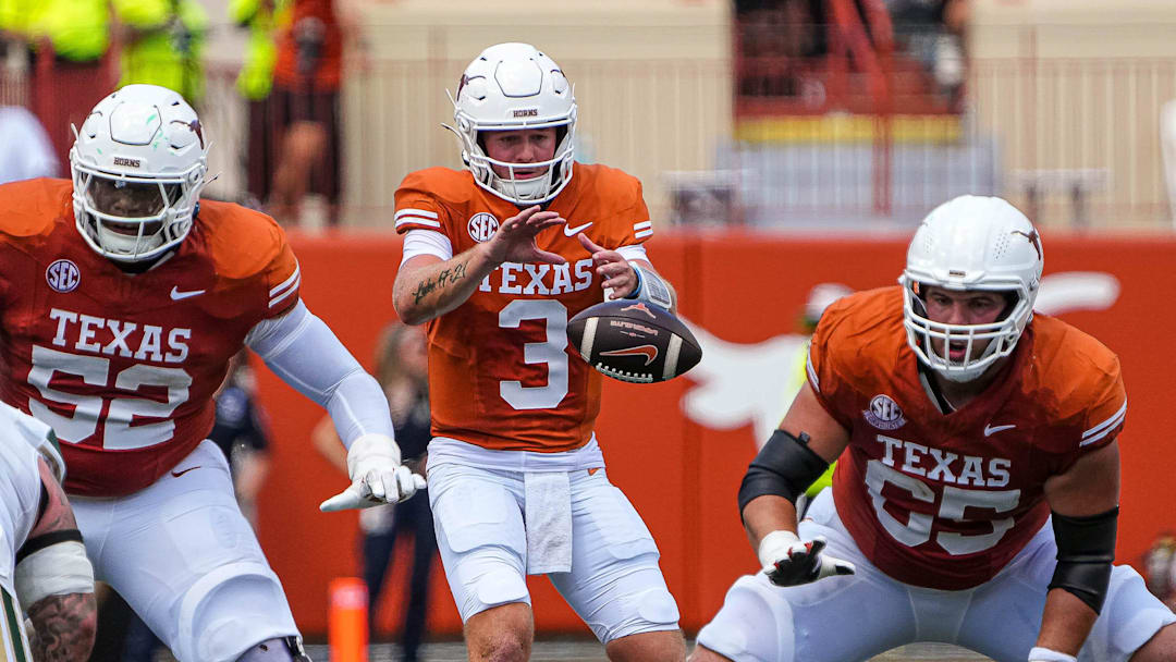 Texas Longhorns quarterback Quinn Ewers (3) snaps the ball during the game against Colorado State at Darrell K Royal-Texas Memorial Stadium in Austin Saturday, Aug. 31, 2024.